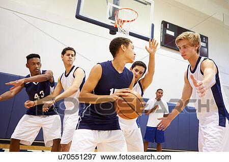 Male High School Basketball Team Playing Game View Large Photo Image Stock Photo - Male High School Basketball Team Playing Game. Fotosearch