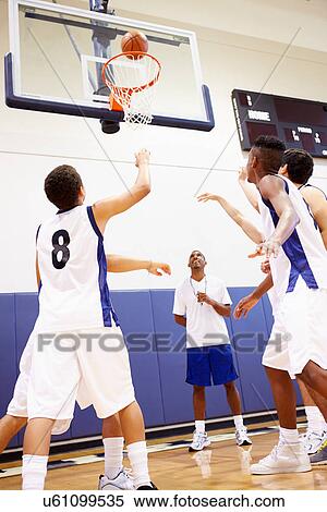 Male High School Basketball Team Playing Game View Large Photo Image Stock Photography - Male High School Basketball Team Playing Game. Fotosearch