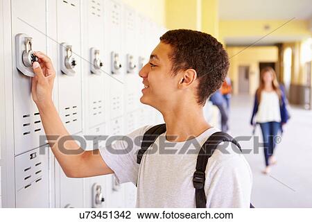 Male High School Student Opening Locker View Large Photo Image Stock Image - Male High School Student Opening Locker. Fotosearch