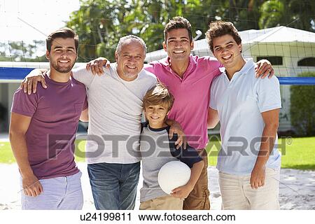 Male Multi Generation Family Playing Volleyball In Garden View Large Photo Image Stock Image - Male Multi Generation Family Playing Volleyball In Garden. Fotosearch