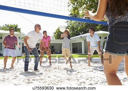 Male Multi Generation Family Playing Volleyball In Garden View Large Photo Image Stock Image - Male Multi Generation Family Playing Volleyball In Garden. Fotosearch