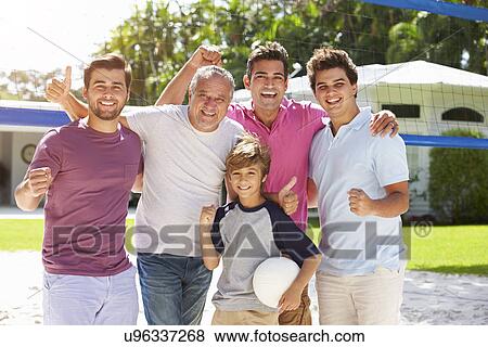 Male Multi Generation Family Playing Volleyball In Garden View Large Photo Image Stock Photo - Male Multi Generation Family Playing Volleyball In Garden. Fotosearch