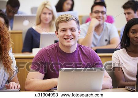 Male University Student Using Laptop In Lecture View Large Photo Image Stock Image - Male University Student Using Laptop In Lecture. Fotosearch