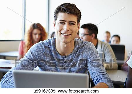 Male University Student Using Laptop In Classroom View Large Photo Image Stock Photography - Male University Student Using Laptop In Classroom. Fotosearch