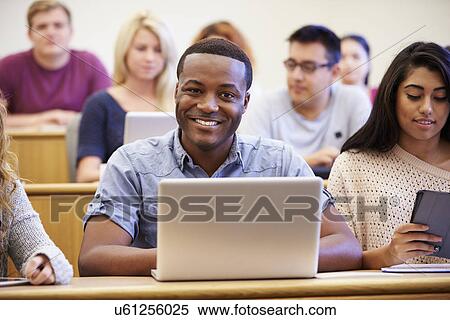 Male University Student Using Laptop In Lecture View Large Photo Image Stock Photography - Male University Student Using Laptop In Lecture. Fotosearch