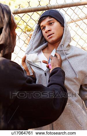 Man Being Threatened With Knife By Gang Member View Large Photo Image Stock Image - Man Being Threatened With Knife By Gang Member. Fotosearch