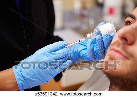 Man Having Botox Treatment At Beauty Clinic View Large Photo Image Stock Image - Man Having Botox Treatment At Beauty Clinic. Fotosearch