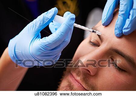 Man Having Botox Treatment At Beauty Clinic View Large Photo Image Stock Photograph - Man Having Botox Treatment At Beauty Clinic. Fotosearch