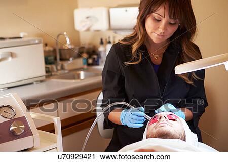Man Having Dermo Abrasion Cosmetic Treatment At Spa View Large Photo Image Stock Image - Man Having Dermo Abrasion Cosmetic Treatment At Spa. Fotosearch
