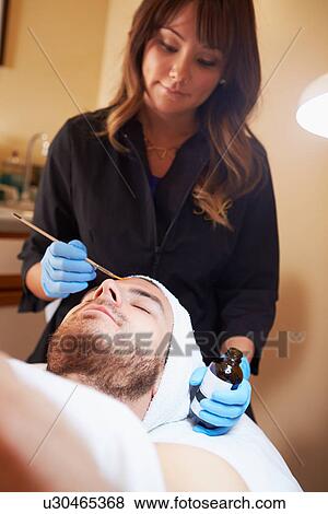 Man Having Dermo Abrasion Cosmetic Treatment At Spa View Large Photo Image Stock Photo - Man Having Dermo Abrasion Cosmetic Treatment At Spa. Fotosearch