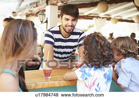 Man Making Children Fruit Smoothies In Restaurant View Large Photo Image Stock Photo - Man Making Children Fruit Smoothies In Restaurant. Fotosearch