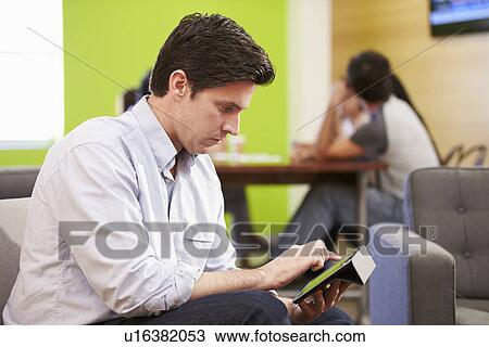 Man Taking A Break Working In Design Studio View Large Photo Image Stock Image - Man Taking A Break Working In Design Studio . Fotosearch