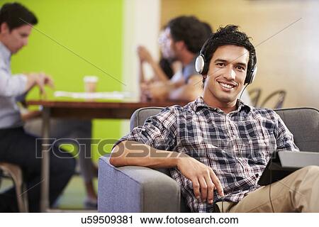 Man Taking A Break Working In Design Studio View Large Photo Image Stock Image - Man Taking A Break Working In Design Studio . Fotosearch