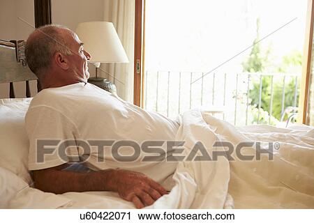 Man Waking Up In Bed In Morning View Large Photo Image Stock Image - Man Waking Up In Bed In Morning. Fotosearch
