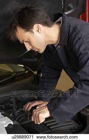 Stock Image - Mechanic at work. Fotosearch