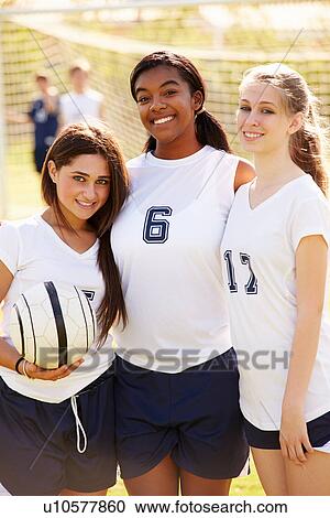 Stock Image - Members Of Female High School Soccer Team. Fotosearch