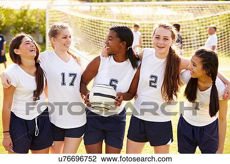 Stock Image - Members Of Female High School Soccer Team. Fotosearch