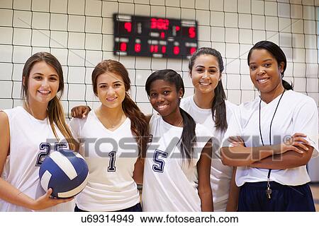 Members Of Female High School Volleyball Team With Coach View Large Photo Image Stock Photo - Members Of Female High School Volleyball Team With Coach. Fotosearch