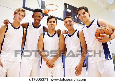 Stock Image - Members Of Male High School Basketball Team. Fotosearch