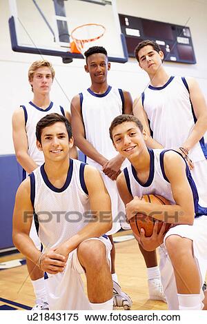 Stock Photography - Members Of Male High School Basketball Team. Fotosearch