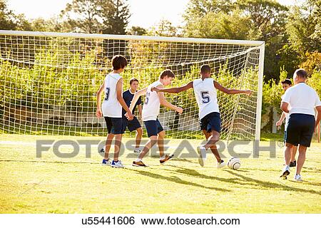 Members Of Male High School Soccer Playing Match View Large Photo Image Stock Photograph - Members Of Male High School Soccer Playing Match. Fotosearch