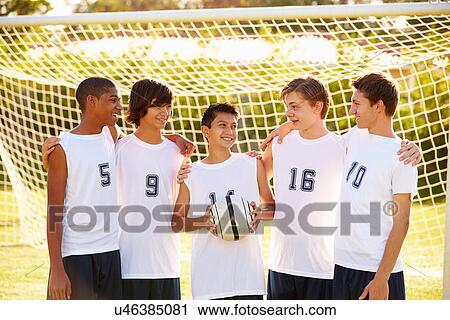 Stock Image - Members Of Male High School Soccer Team. Fotosearch