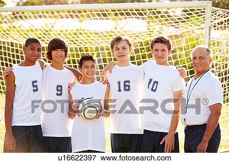 Members Of Male High School Soccer Team With Coach View Large Photo Image Stock Photo - Members Of Male High School Soccer Team With Coach. Fotosearch
