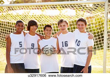 Stock Photograph - Members Of Male High School Soccer Team. Fotosearch