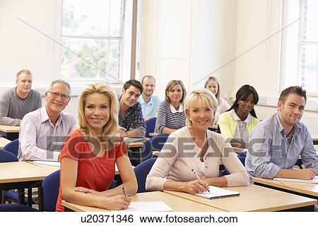 Mixed group of students in class View Large Photo Image Stock Photograph - Mixed group of students in class. Fotosearch