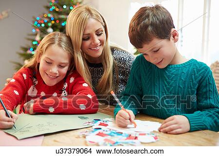 Mother And Children Writing Letter To Santa Together View Large Photo Image Picture - Mother And Children Writing Letter To Santa Together. Fotosearch