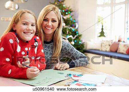 Mother And Daughter Writing Letter To Santa Together View Large Photo Image Stock Image - Mother And Daughter Writing Letter To Santa Together. Fotosearch