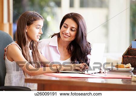 Mother And Teenage Daughter Looking At Laptop Together View Large Photo Image Stock Image - Mother And Teenage Daughter Looking At Laptop Together. Fotosearch