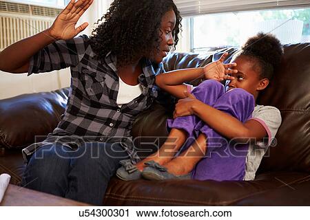 Mother Being Physically Abusive Towards Daughter At Home View Large Photo Image Stock Image - Mother Being Physically Abusive Towards Daughter At Home. Fotosearch