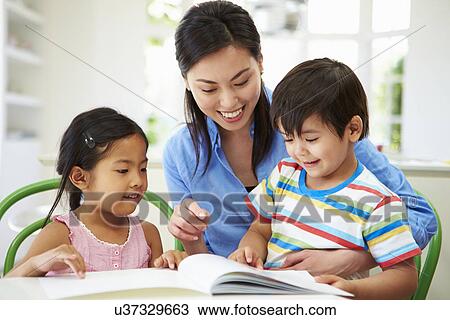 Mother Helping Children With Homework View Large Photo Image Stock Image - Mother Helping Children With Homework. Fotosearch