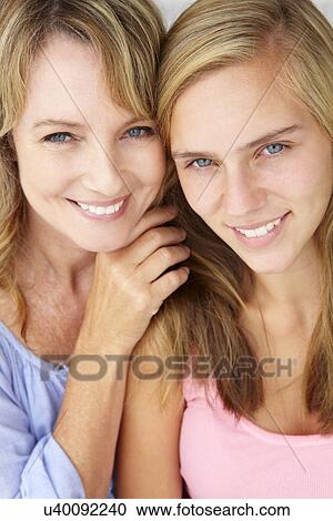 Stock Image - Mother with teenage daughter. Fotosearch