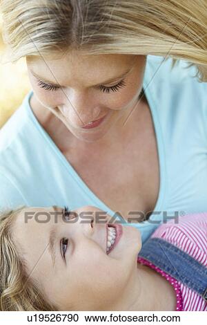 Mother with young daughter View Large Photo Image Stock Image - Mother with young daughter. Fotosearch
