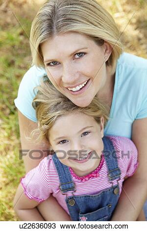 Stock Image - Mother with young daughter. Fotosearch
