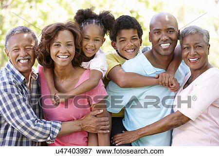Stock Photo - Multi-generation family in park. Fotosearch