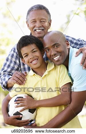 Multi-generation family in park View Large Photo Image Stock Photography - Multi-generation family in park. Fotosearch
