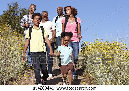 Stock Photography - Multi-generation family on country hike. Fotosearch