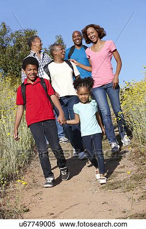 Stock Photography - Multi-generation family on country hike. Fotosearch