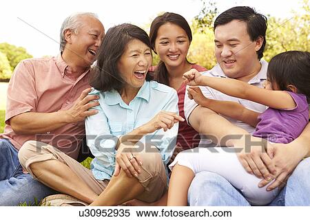 Multi Generation Family Playing Game In Park Together View Large Photo Image Stock Photography - Multi Generation Family Playing Game In Park Together. Fotosearch