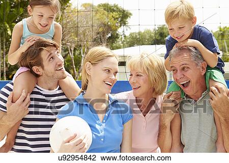 Multi Generation Family Playing Volleyball Together View Large Photo Image Stock Image - Multi Generation Family Playing Volleyball Together. Fotosearch