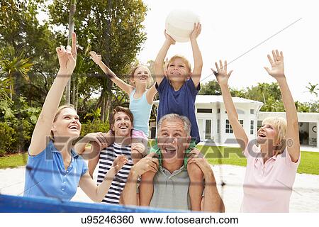 Multi Generation Family Playing Volleyball Together View Large Photo Image Stock Image - Multi Generation Family Playing Volleyball Together. Fotosearch