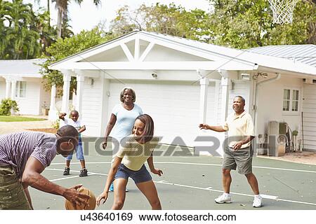 Multi Generation Family Playing Basketball Together View Large Photo Image Stock Photo - Multi Generation Family Playing Basketball Together. Fotosearch
