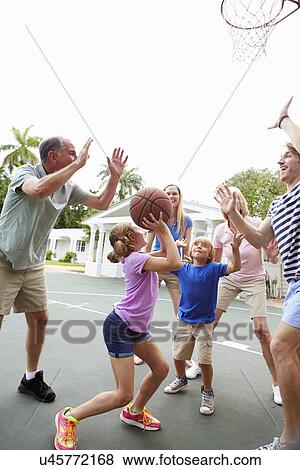 Multi Generation Family Playing Basketball Together View Large Photo Image Stock Photo - Multi Generation Family Playing Basketball Together. Fotosearch