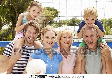 Multi Generation Family Playing Volleyball Together View Large Photo Image Stock Photo - Multi Generation Family Playing Volleyball Together. Fotosearch