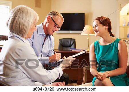 Older Couple Talking To Financial Advisor In Office View Large Photo Image Stock Photograph - Older Couple Talking To Financial Advisor In Office. Fotosearch