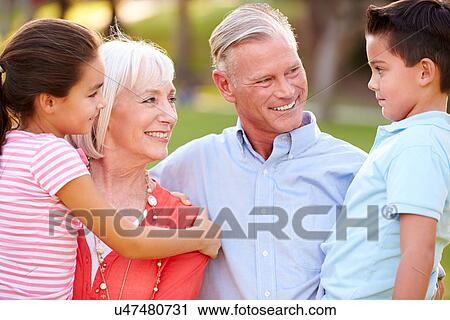Outdoor Portrait Of Grandparents With Grandchildren In Park View Large Photo Image Stock Image - Outdoor Portrait Of Grandparents With Grandchildren In Park. Fotosearch