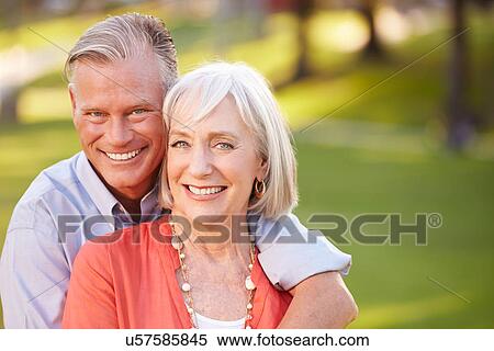 Stock Photography - Outdoor Portrait Of Mature Romantic Couple. Fotosearch